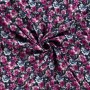 Tissu fleurs fuschia fond bleu marine